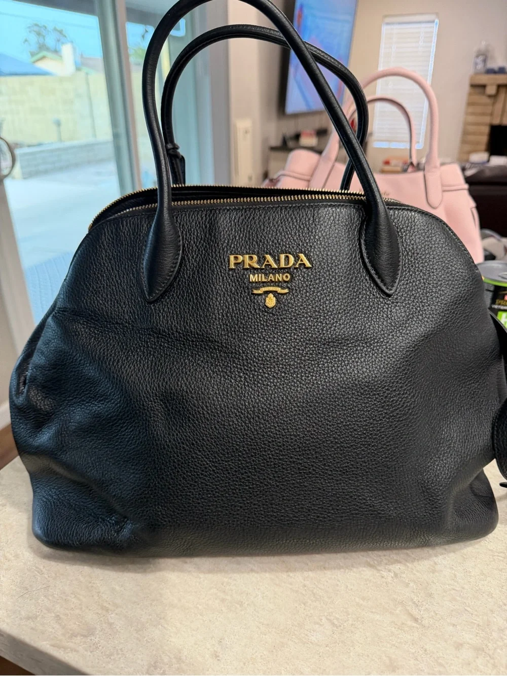 Prada Black Pebbled Leather Satchel with Gold Logo